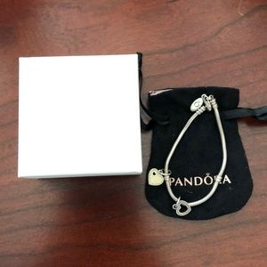 Pandora sterling silver bracelet with 2 charms